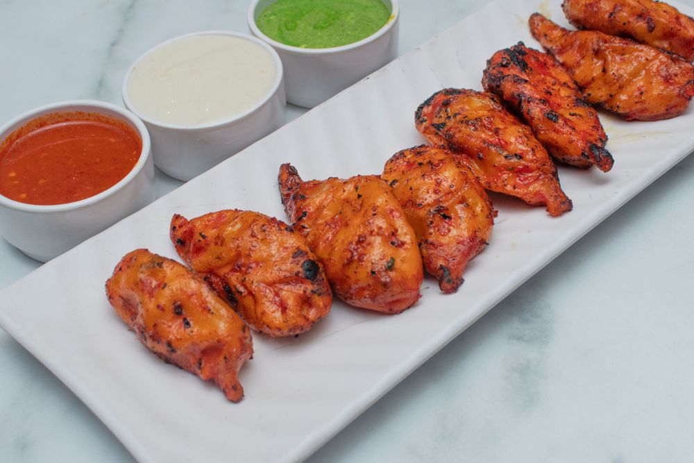 Chicken tandoori momos with mint chutney